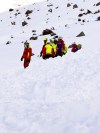 Italian Alpine rescuers at the scene of an avalanche that occurred Thursday, Feb. 5, 2026, above Solda, in South Tyrol, Italy, killing two members of a group of ski mountaineers.(Italian Alpine Rescue via AP)
