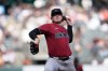 FILE - Arizona Diamondbacks pitcher Andrew Saalfrank throws against the San Francisco Giants during the ninth inning of a baseball game, in San Francisco, Sept. 10, 2025. (AP Photo/Jeff Chiu, File)