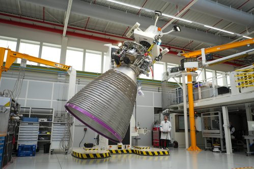 A mechanic works on the Vulcain 2.1 engine that powers the Ariane 64 rocket, at the ArianeGroup's plant in Vernon, west of Paris, Wednesday, Feb. 4, 2026. (AP Photo/Thibault Camus)