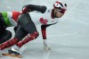 Canada’s William Dandjinou competes in the men's 1,000 metre short track speedskating heats at the 2026 Winter Olympics, in Milan, on Tuesday, February 10, 2026. THE CANADIAN PRESS/Darryl Dyck