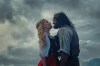 This image released by Warner Bros. Pictures shows Margot Robbie, left, and Jacob Elordi in a scene from 