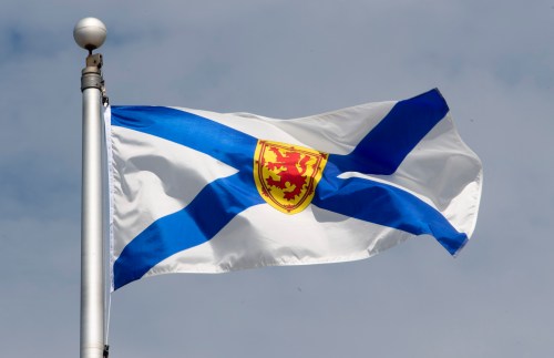 Nova Scotia's provincial flag flies on a flagpole in Ottawa on June 30, 2020. THE CANADIAN PRESS/Adrian Wyld