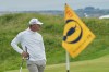 FILE - Lucas Glover of the United States waits to putt on the 10th green during the first round of the British Open golf championship at the Royal Portrush Golf Club, Northern Ireland, July 17, 2025. (AP Photo/Jon Super, File)