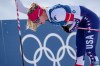 Jessie Diggins, of the United States, reacts after finishing a quarterfinal of the cross-country skiing women's sprint classic at the 2026 Winter Olympics, in Tesero, Italy, Tuesday, Feb. 10, 2026. (AP Photo/Evgeniy Maloletka)