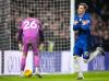 Chelsea's Cole Palmer, right, celebrates scoring his side's second goal of the game from a penalty against Leeds United's during an English Premier League soccer match in London, Tuesday, Feb. 10, 2026. (Nick Potts/PA via AP)