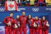 Canada's Felix Roussel, Steven Dubois, William Dandjinou, Courtney Sarault, Florence Brunelle and Kim Boutin pose with their silver medals after finishing second in the short track speedskating mixed team relay final at the 2026 Winter Olympics, in Milan, on Tuesday, February 10, 2026. THE CANADIAN PRESS/Darryl Dyck
