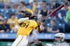 FILE - Pittsburgh Pirates' Andrew McCutchen watches his RBI double during the first inning of a baseball game against the Colorado Rockies on Aug. 22, 2025, in Pittsburgh. (AP Photo/Matt Freed, File)