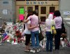 Students wear pink in honour of Anastasia De Sousa before they re-enter Dawson College in Montreal Monday, Sept. 18, 2006. THE CANADIAN PRESS/Ryan Remiorz