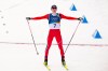 Jens Luraas Oftebro, of Norway, crosses the finish line to win the Nordic Combined Individual Gundersen Normal Hill/10km competition at the 2026 Winter Olympics, in Tesero, Italy, Wednesday, Feb. 11, 2026. (AP Photo/Kirsty Wigglesworth)