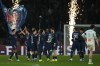 PSG players celebrate at the end of the French League One soccer match between Paris Saint-Germain and Marseille in Paris, Sunday, Feb. 8, 2026. (AP Photo/Thibault Camus)