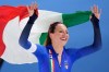 Francesca Lollobrigida of Italy celebrates winning the gold medal in the women's 5,000 meters speedskating race at the 2026 Winter Olympics, in Milan, Italy, Thursday, Feb. 12, 2026. (AP Photo/Luca Bruno)