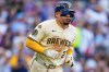 FILE - Milwaukee Brewers' William Contreras runs down the first base line during the second inning in Game 1 of baseball's National League Division Series against the Chicago Cubs in Milwaukee, Oct. 4, 2025. (AP Photo/Kayla Wolf, File)