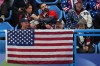 US supporters watch during the gold medal mixed doubles curling match between USA and Sweden, at the 2026 Winter Olympics, in Cortina D'Ampezzo, Italy, Tuesday, Feb. 10, 2026. (AP Photo/Fatima Shbair)