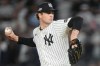 FILE - New York Yankees pitcher Cam Schlittler delivers against the Toronto Blue Jays during the first inning of Game 4 of baseball's American League Division Series, Oct. 8, 2025, in New York. (AP Photo/Yuki Iwamura, File)