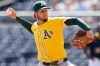 FILE - Athletics pitcher Mitch Spence delivers during the first inning of a baseball game against the Pittsburgh Pirates, Sept. 21, 2025, in Pittsburgh. (AP Photo/Matt Freed, File)