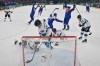 Slovakia's Adam Ruzicka, rear right, celebrates with teammates after scoring his team's fourth goal during a preliminary round match of men's ice hockey between Slovakia and Finland at the 2026 Winter Olympics, in Milan, Italy, Wednesday, Feb. 11, 2026. (Alexander Nemenov/Pool Photo via AP)