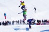Canada's Audrey McManiman (12) competes in the women's snowboard cross at the Milano Cortina 2026 Winter Olympic Games in Livigno, Italy, Friday, Feb. 13, 2026. THE CANADIAN PRESS/Sean Kilpatrick