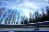 Italy's Simona de Silvestro slides down the track during a women's monobob training session at the 2026 Winter Olympics, in Cortina d'Ampezzo, Italy, Friday, Feb. 13, 2026. (AP Photo/Aijaz Rahi)