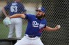 Los Angeles Dodgers pitcher Alex Vesia works out during spring training baseball Friday, Feb. 13, 2026, in Phoenix. (AP Photo/Ross D. Franklin)