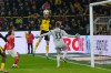 Dortmund's Maximilian Beier, top, scores his side's second goal during the German Bundesliga soccer match between Borussia Dortmund and FSV Mainz 05 in Dortmund, Germany, Friday, Feb. 13, 2026. (AP Photo/Martin Meissner)