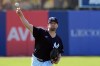 New York Yankees pitcher Gerrit Cole warms up before a bullpen session during a spring training baseball workout Friday, Feb. 13, 2026, in Tampa, Fla. (AP Photo/Chris O'Meara)