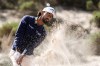 Akshay Bhatia hits from a bunker toward the fourth fairway at Spyglass Hill Golf Course during the second round of the AT&T Pebble Beach Pro-Am golf tournament in Pebble Beach, Calif., Friday, Feb. 13, 2026. (AP Photo/Godofredo A. Vásquez)