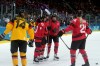 Canada's Marie-Philip Poulin (29) celebrates her goal with teammates during the third period of a women's hockey quarterfinal game against Germany at the 2026 Winter Olympics, in Milan, Saturday, Feb. 14, 2026. THE CANADIAN PRESS/Darryl Dyck
