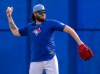 Toronto Blue Jays pitcher Cody Ponce warms up at Spring Training in Dunedin, Fla. on Sunday Feb. 15, 2026. THE CANADIAN PRESS/Frank Gunn