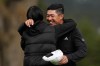 Collin Morikawa, right, celebrates with his wife, Katherine Zhu, after making a birdie putt on the 18th hole at Pebble Beach Golf Links during the final round to win the AT&T Pebble Beach Pro-Am golf tournament in Pebble Beach, Calif., Sunday, Feb. 15, 2026. (AP Photo/Godofredo A. Vásquez)