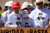 Relatives of Antonio Esparza, one of 10 mine workers abducted in neighboring Sinaloa state, during protest march in Hermosillo, Mexico, Saturday, Feb. 14, 2026. (AP Photo/Luis Gutierrez)