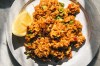 This image released by Voracious shows a recipe for tomato bason sticky rice, from the cookbook 