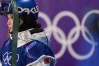 China's Eileen Gu waits for her scores as she competes in the women's freestyle skiing big air qualifications at the 2026 Winter Olympics, in Livigno, Italy, Saturday, Feb. 14, 2026. (AP Photo/Abbie Parr)