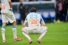 Marseille's Pierre-Emile Hojbjerg reacts at the end of the French League One soccer match between Marseille and Strasbourg in Marseille, France, Saturday, Feb. 14, 2026. (AP Photo/Philippe Magoni)