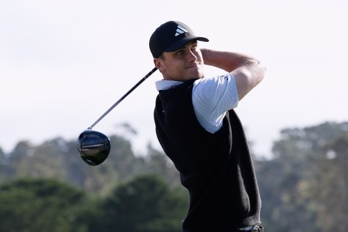 Ludvig Åberg, from Sweden, hits from the third tee at Pebble Beach Golf Links during the second round of the AT&T Pebble Beach Pro-Am golf tournament in Pebble Beach, Calif., Friday, Feb. 13, 2026. (AP Photo/Godofredo A. Vásquez)