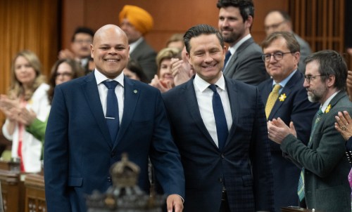 Conservative Leader Pierre Poilievre walks with new MP Jamil Jivani as he takes his place in the House of Commons before question period on Monday, April 8, 2024 in Ottawa. THE CANADIAN PRESS/Adrian Wyld