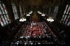 FILE - Members of the House of Lords and guests take their seats in the Lords Chamber, ahead of the State Opening of Parliament, in the Houses of Parliament, in London, July 17, 2024. (Henry Nicholls/POOL via AP, File)
