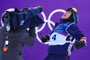 United States' Jake Canter celebrates during the men's snowboarding slopestyle finals at the 2026 Winter Olympics, in Livigno, Italy, Wednesday, Feb. 18, 2026. (AP Photo/Rebecca Blackwell)