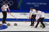 Canada's Brad Jacobs, Marc Kennedy, and Tyler Tardi in action during the men's curling round robin session against Czechia, at the 2026 Winter Olympics, in Cortina d'Ampezzo, Italy, Monday, Feb. 16, 2026. (AP Photo/Misper Apawu)