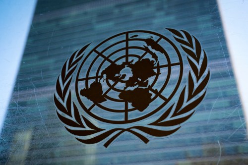 FILE - The symbol of the United Nations is displayed outside the Secretariat Building, Feb. 28, 2022, at United Nations Headquarters. (AP Photo/John Minchillo, File)