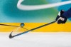 Finland's Miro Heiskanen (41), right, tries to control the puck during a men's ice hockey quarterfinal game between Finland and Switzerland at the 2026 Winter Olympics, in Milan, Italy, Wednesday, Feb. 18, 2026. (AP Photo/Petr David Josek)