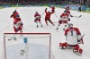 Czech Republic's goalkeeper Lukas Dostal reacts after failing to stop Canada's third goal scored by Canada's Nick Suzuki (10) during a men's ice hockey quarterfinal game between Canada and Czechia at the 2026 Winter Olympics, in Milan, Italy, Wednesday, Feb. 18, 2026. (Alexander Nemenov/Pool Photo via AP)