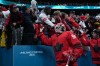 Canada goalie Jordan Binnington (50) and Mitch Marner (93) greet fans as they leave the ice after their overtime win against Czechia in a quarterfinal men's hockey game at the 2026 Winter Olympics, in Milan, on Wednesday, Feb. 18, 2026. THE CANADIAN PRESS/Darryl Dyck