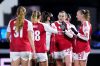 Arsenal's Alessia Russo, second from right, is congratulated by her teammates after scoring the opening goal against Oud-Heverlee Leuven during a UEFA Women's Champions League playoff, second leg soccer match, Wednesday, Feb. 18, 2026, in London. (Adam Davy/PA via AP)