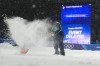 Crews work to clear the finish area during a weather delay ahead of the women's free ski big air final at the Milano Cortina 2026 Winter Olympic Games in Livigno, Italy on Monday, Feb. 16, 2026. THE CANADIAN PRESS/Sean Kilpatrick