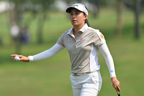 Jeeno Thitikul of Thailand reacts after putting on the first hole during the first round of the LPGA Honda Thailand golf tournament in Pattaya, Thailand, Thursday, Feb. 19, 2026. (AP Photo/Kittinun Rodsupan)
