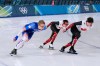 Speed skaters Jordan Stolz of the U.S., left, Beatrice Lamarche of Canada, center, and Cedrick Brunet of Canada practices at the 2026 Winter Olympics, in Milan, Italy, Tuesday, Feb. 17, 2026. (AP Photo/Ben Curtis)