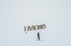 A person cross-country skis, Thursday, Feb. 19, 2026, during the 2026 Winter Olympics in Livigno, Italy. (AP Photo/Julia Demaree Nikhinson)