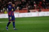 Barcelona's Roony Bardghji reacts as Girona players celebrate after winning a Spanish La Liga soccer match between Girona and Barcelona in Girona, Spain, Monday, Feb. 16, 2026. (AP Photo/Joan Monfort)