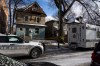Police vehicles are shown outside the scene of a mass shooting at a home in Winnipeg on Monday, Nov. 27, 2023. THE CANADIAN PRESS/Aaron Vincent Elkaim