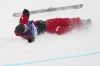 Canada's Cassie Sharpe crashes during the women's freestyle skiing halfpipe qualifications at the 2026 Winter Olympics, in Livigno, Italy, Thursday, Feb. 19, 2026. (AP Photo/Gregory Bull)